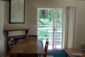 Crane Cabin Living room and deck at Creekside Resort