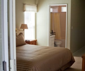 Crane Cabin bedroom and bath at Creekside Resort